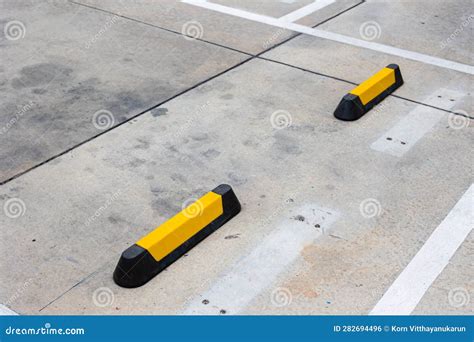 Wheelstop (Parking Block) Safety on Parking Lot .